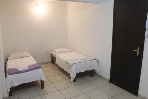 Katil atau katil-katil dalam bilik di Hotel Nossa Senhora da Conceição