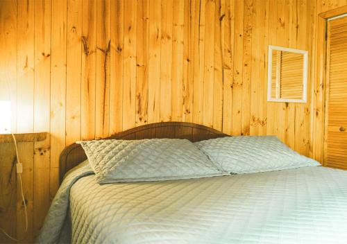 Llit o llits en una habitació de Cabaña Marquesana