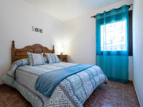 Postel nebo postele na pokoji v ubytování Apartamentos Ca de Marti