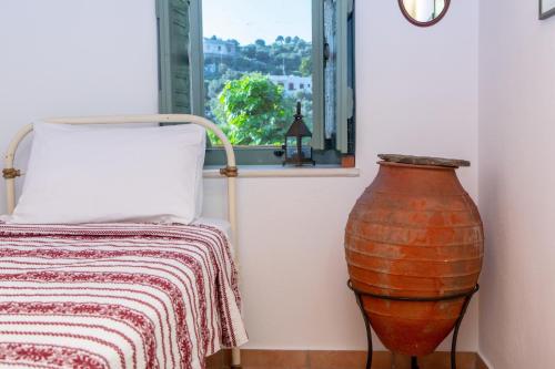 Postel nebo postele na pokoji v ubytování Villa Matakia