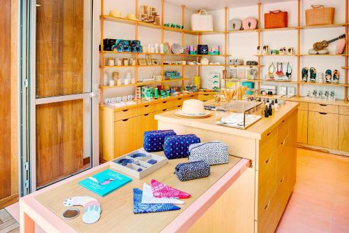 a room with a counter with many items on it at The Laylow, Autograph Collection in Honolulu