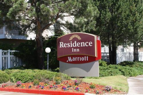 a sign for a residence inn marriot in a garden at Residence Inn Denver Tech Center in Greenwood Village