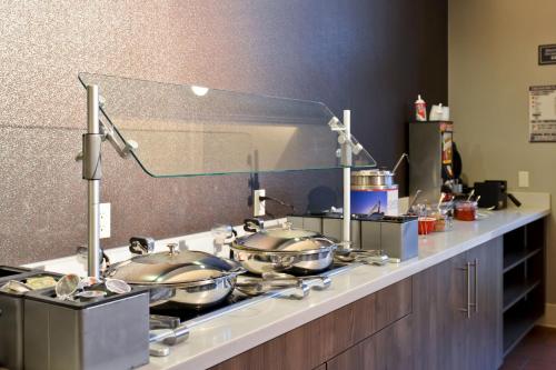 a counter with several pots and pans on it at Residence Inn Los Angeles LAX/El Segundo in El Segundo