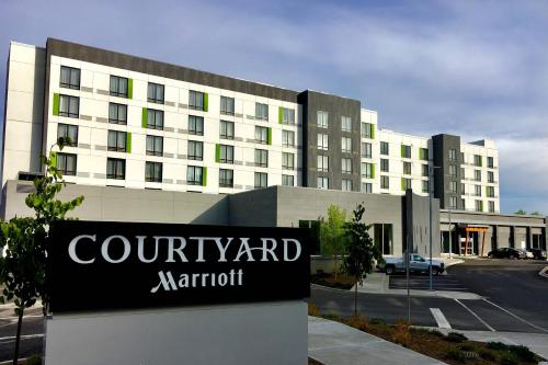 a building with a sign in front of it at Courtyard by Marriott Prince George in Prince George