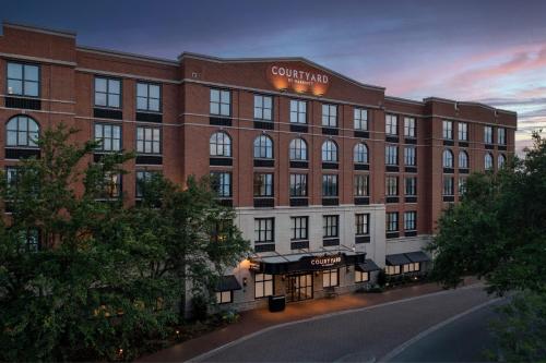 a rendering of a hotel with a building at Courtyard by Marriott Savannah Downtown - Historic District in Savannah