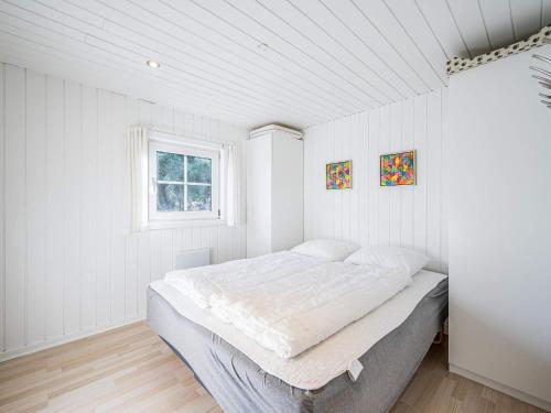 Ένα ή περισσότερα κρεβάτια σε δωμάτιο στο 8 person holiday home in Blåvand