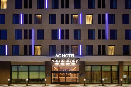 a facade of a hotel with blue lights at AC Hotel by Marriott Columbus Downtown in Columbus