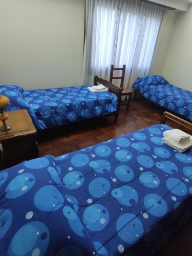 Una cama o camas en una habitación de Casa JUCALI