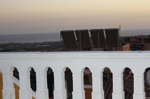 a view from the roof of a building with chairs at Villa Granada Motril in Motril