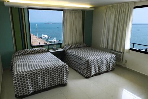 Hotel Mar y Tierraにあるベッド