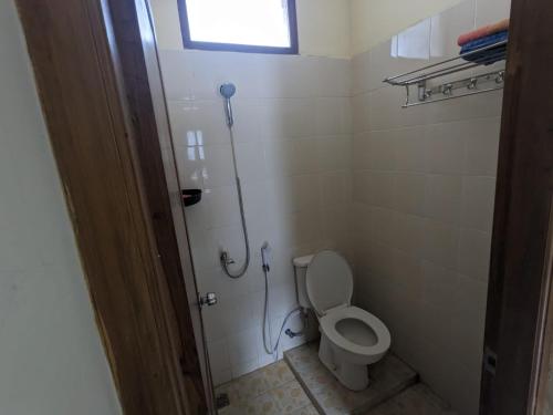 Ванная комната в Rumah Pagar Merah Homestay