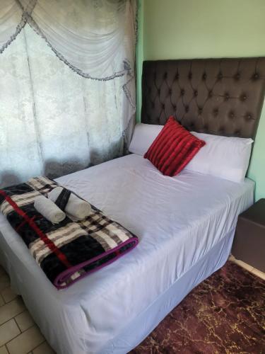 Postel nebo postele na pokoji v ubytování Florida Lake Guest House