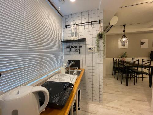 Kuchyň nebo kuchyňský kout v ubytování Hotel Ougien