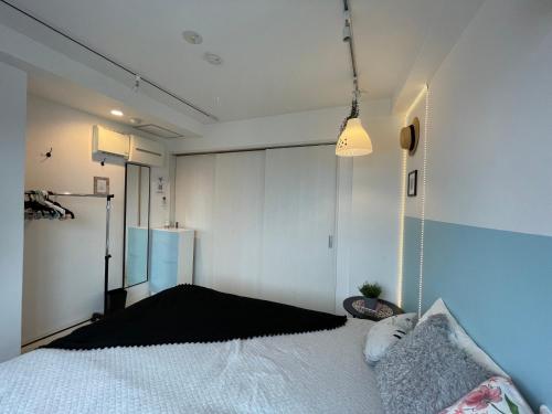 Postel nebo postele na pokoji v ubytování Hotel Ougien