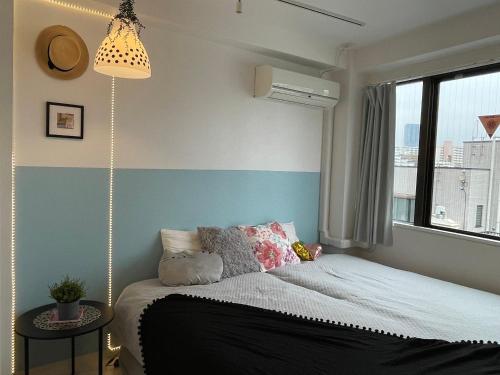 Postel nebo postele na pokoji v ubytování Hotel Ougien