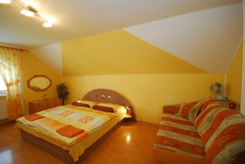 Apartman Elegantにあるベッド