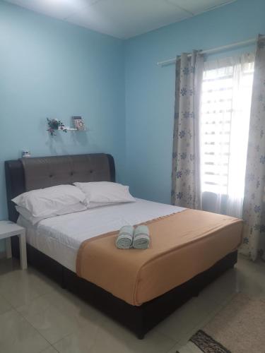 Voodi või voodid majutusasutuse Haji Homestay - A tiny house with 2 bedrooms toas
