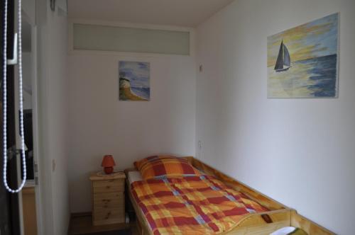 Cama o camas de una habitación en Ferienwohnung Ostsee App. 6111