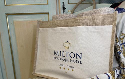 a tote bag that says millionournroute hotel on it at Milton Boutique Hotel - Adults Only in Lido di Jesolo