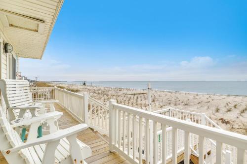 a house with a staircase leading to the beach at Lisa Lu by Oak Island Accommodations in Oak Island