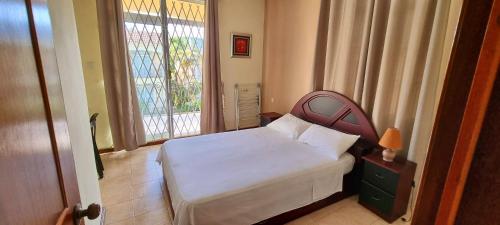 Postel nebo postele na pokoji v ubytování Residence Le Choisy