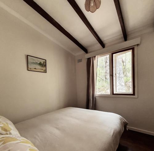 Ένα ή περισσότερα κρεβάτια σε δωμάτιο στο Gum Grove Chalets