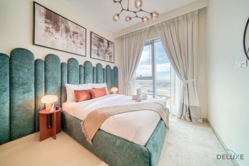 Postel nebo postele na pokoji v ubytování Distinguished 2BR at Harbour Views Tower 1 by Deluxe Holiday Homes