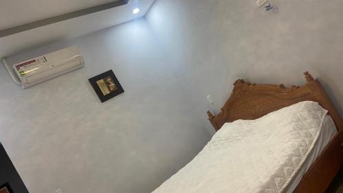 Ein Bett oder Betten in einem Zimmer der Unterkunft Nhà Nghỉ Blue Sapphire - hotel