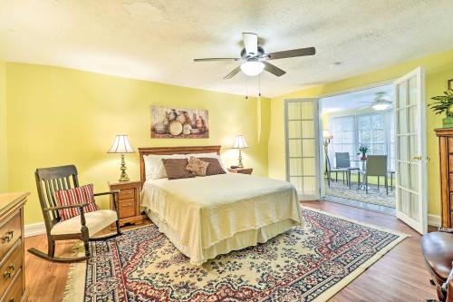 a bedroom with a bed and a ceiling fan at Johnson City Vacation Rental 1 Block to ETSU in Johnson City