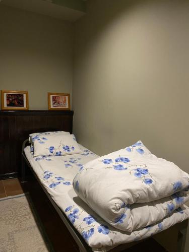 Ένα ή περισσότερα κρεβάτια σε δωμάτιο στο Mang’o Hostel