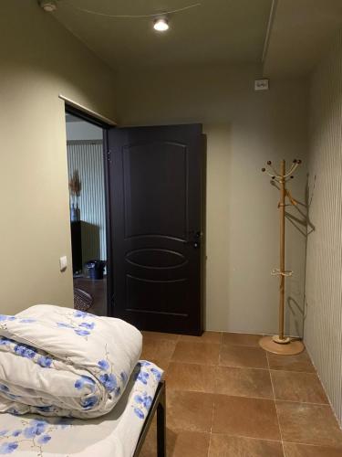 Ένα ή περισσότερα κρεβάτια σε δωμάτιο στο Mang’o Hostel