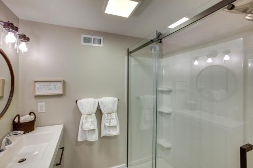 a bathroom with a glass shower and a sink at Byrdstown Home Near Dale Hollow Lake! in Byrdstown