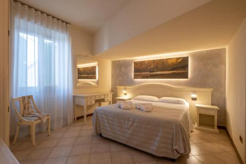 Letto o letti in una camera di Hotel San Lorenzo