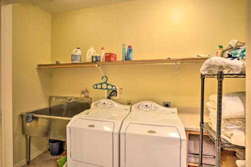 a laundry room with two washes and a sink at Luxury Vacation Rental in the Berkshires! in Williamstown