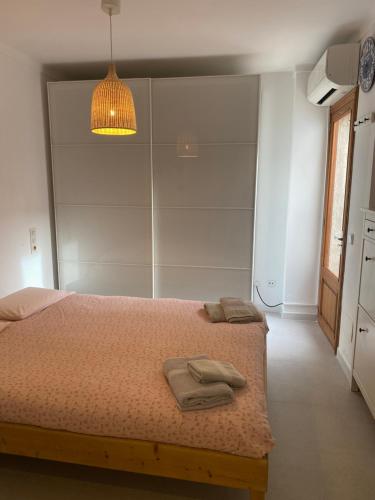 En eller flere senger på et rom på Casa Portoblau