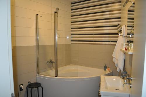 Kúpeľňa v ubytovaní Apartments City&style