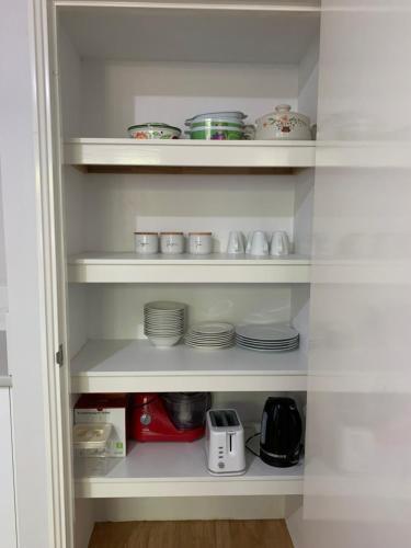 Η κουζίνα ή μικρή κουζίνα στο Sandalwood Guest Room