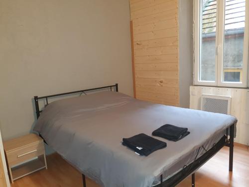 Ένα ή περισσότερα κρεβάτια σε δωμάτιο στο Appartement VanSuly 1