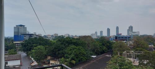 a view of a city with buildings and trees at Jays Guest - Rajagiriya Colombo in Rajagiriya