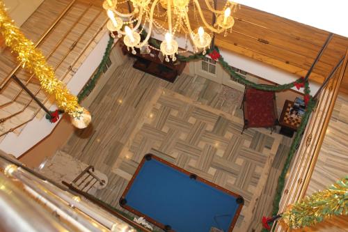 an overhead view of a room with a chandelier at Villa Granada Motril in Motril