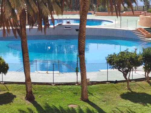 Appartement 60 M2,piscine, commerce