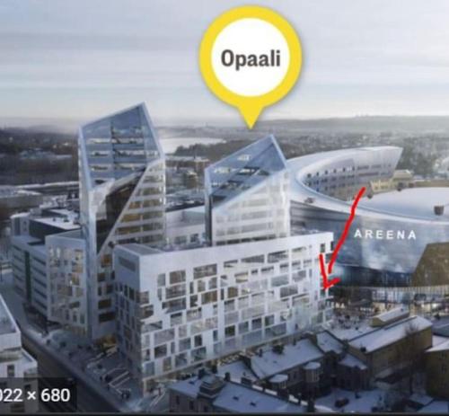 a rendering of an apartment building with a red arrow at Tampere City studio Areena in Tampere