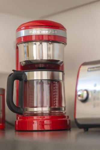 a red blender sitting on top of a counter at Boardinghouse HOME - adults only - in Konstanz
