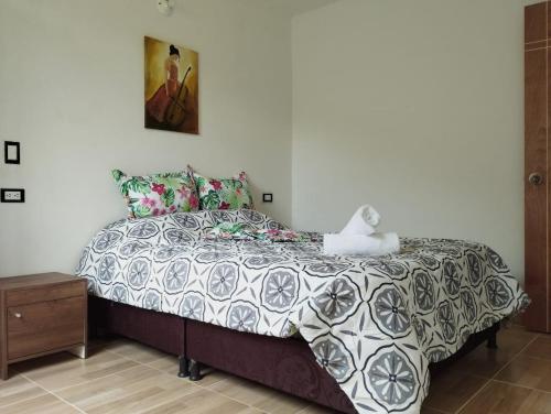 Ένα ή περισσότερα κρεβάτια σε δωμάτιο στο Casa Hotel Castellón
