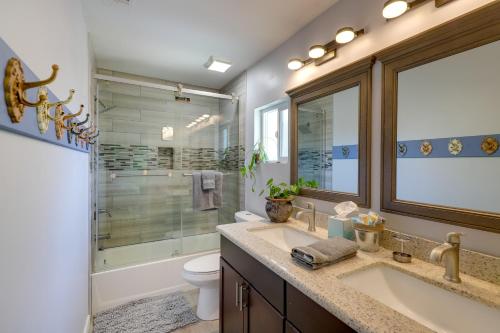 a bathroom with a sink and a toilet and a shower at Payson Vacation Rental with Private Patio! in Payson