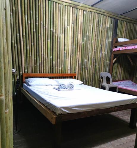 Una cama o camas en una habitación de Bella's Beach Resort Apartment 8
