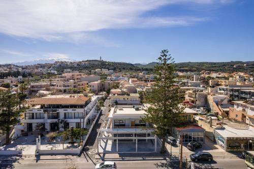 an aerial view of a city with buildings at Orama Luxury Apartments in Nea Kydonia