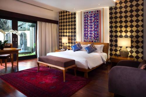 Ένα ή περισσότερα κρεβάτια σε δωμάτιο στο Bintang Bali Villa