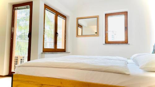 Ένα ή περισσότερα κρεβάτια σε δωμάτιο στο Apartments Katrca Bežigrad