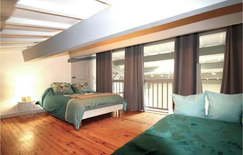 Ένα ή περισσότερα κρεβάτια σε δωμάτιο στο Beautiful Home In Malataverne With Kitchen